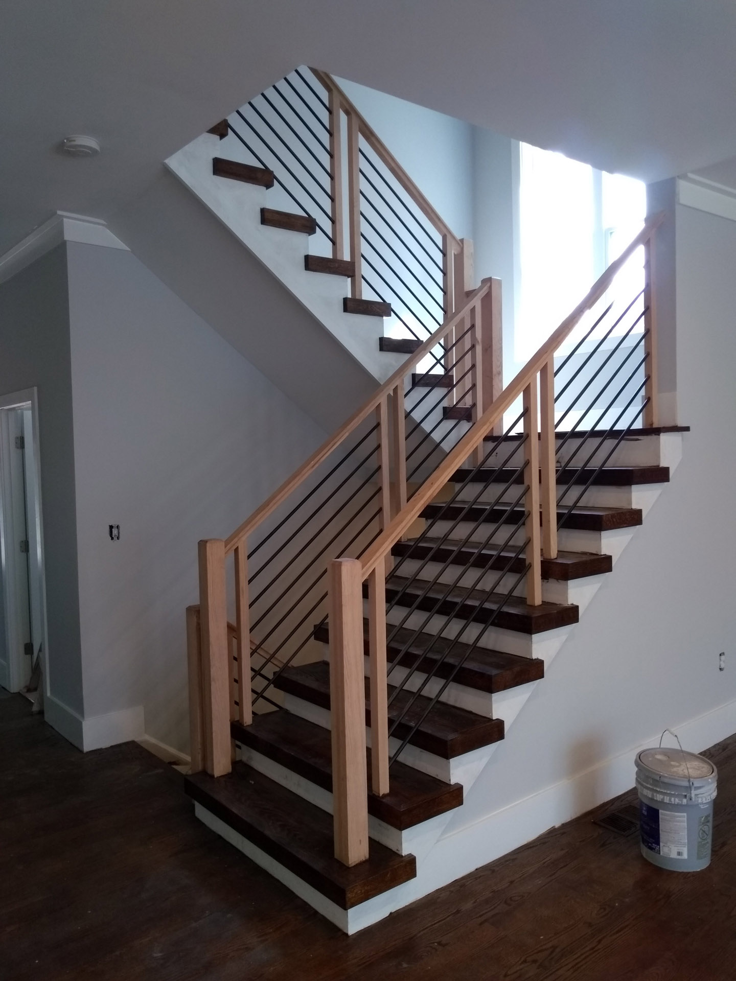 This showcases a completed loudoun stairs project within a home in northern virginia. This showcases the rails that they handmade. 