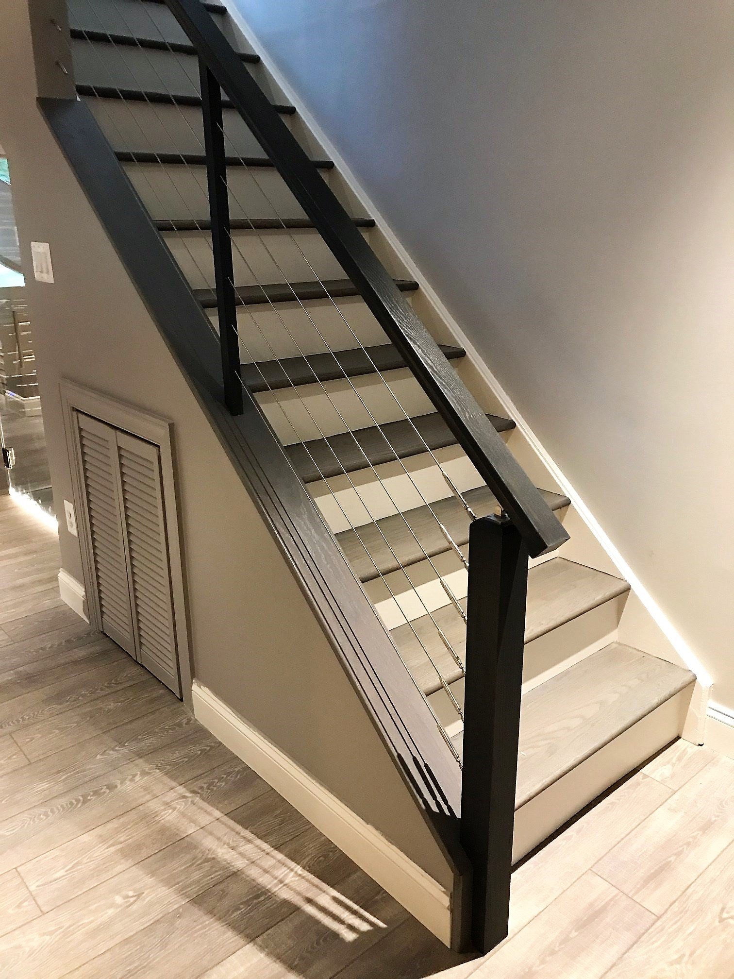 This showcases a completed loudoun stairs project within a home in northern virginia. This showcases the rails that they handmade. 